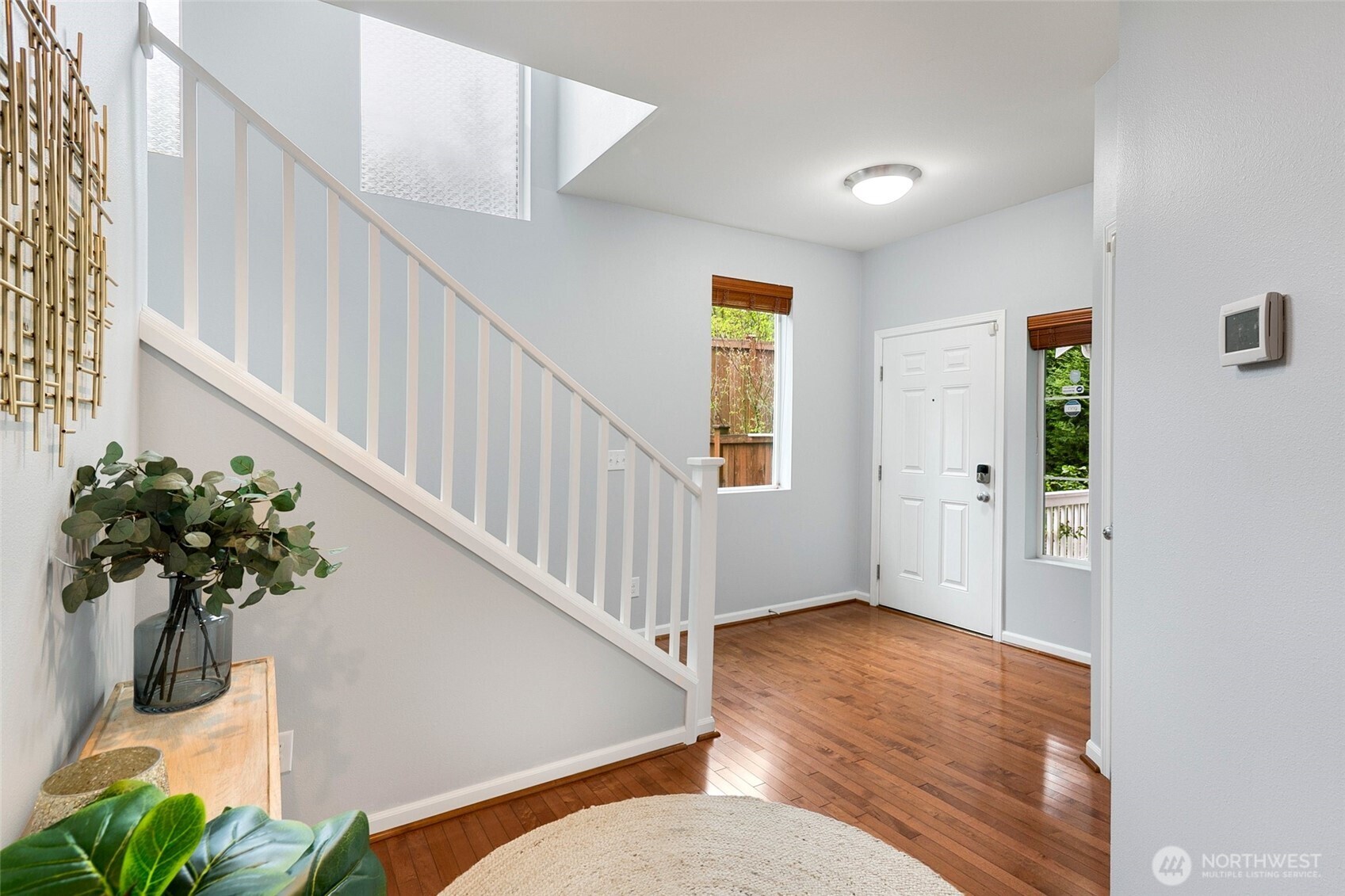 3931 177th Street Southeast Bothell, WA 98012 - Photo 18 of 39 a view of entryway with wooden floor