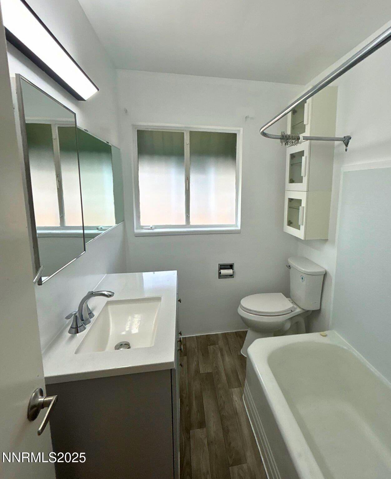 320 West Plumb Lane Reno, NV 89509 - Photo 16 of 22 a bathroom with a sink and a bathtub