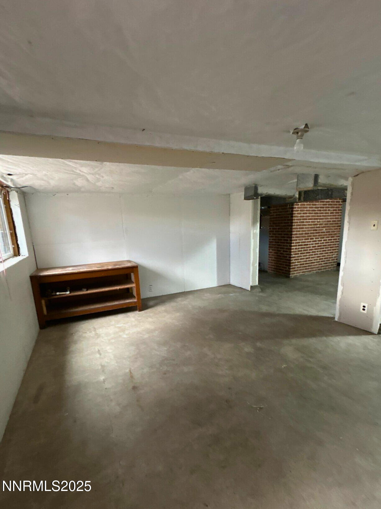 320 West Plumb Lane Reno, NV 89509 - Photo 18 of 22 a view of room with stairs and a couch