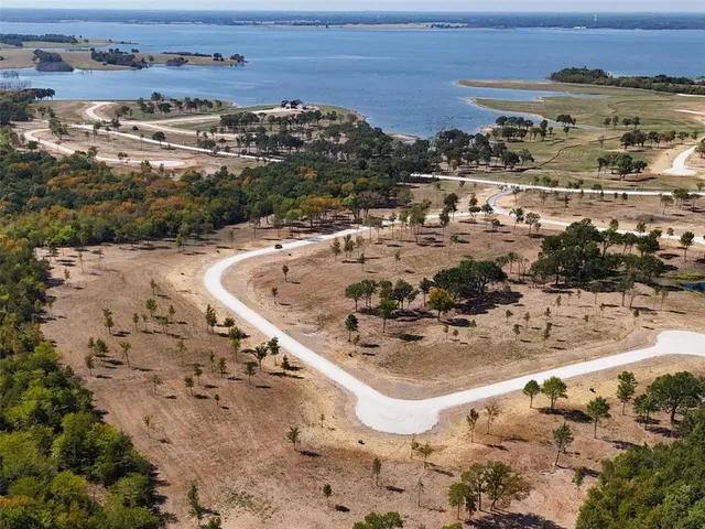 a view of a dry yard covered with snow