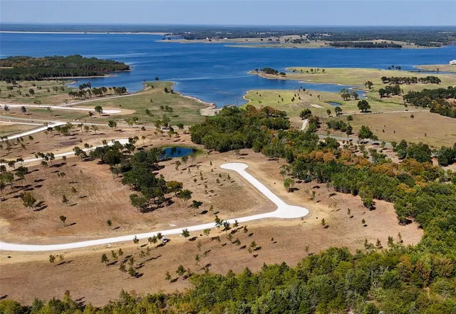 a view of a pathway with a yard
