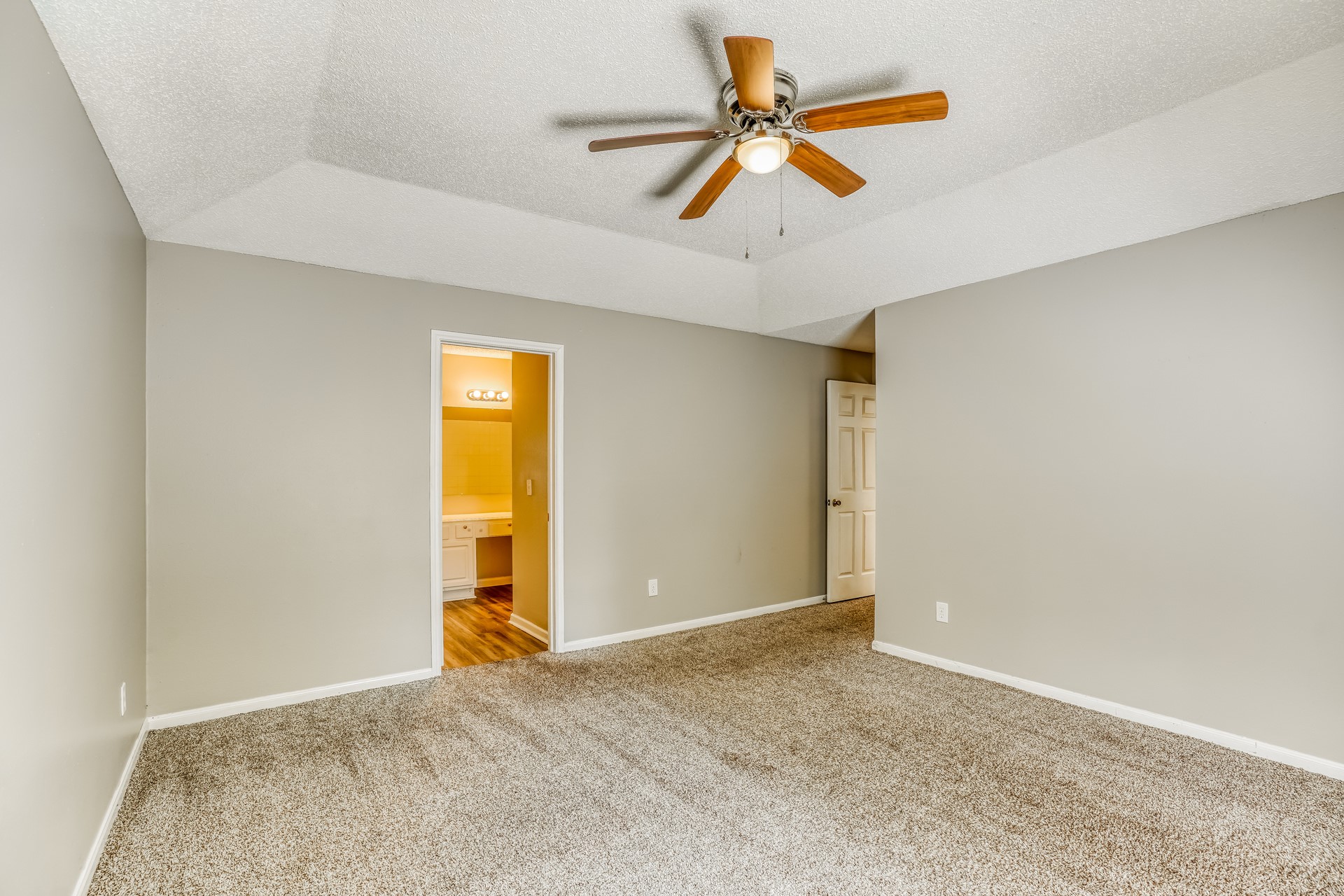 1635 Ridgebriar Drive Houston, TX 77014 - Photo 12 of 21 an empty room with closet and a ceiling fan