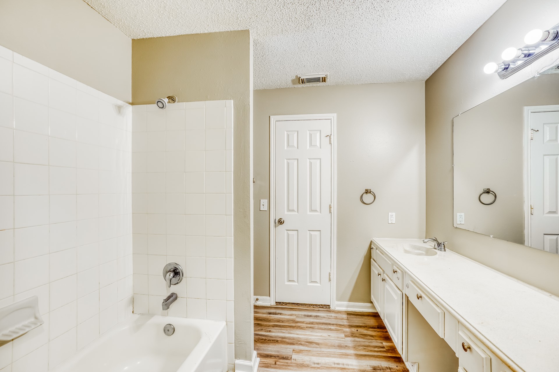 1635 Ridgebriar Drive Houston, TX 77014 - Photo 14 of 21 a bathroom with a double vanity sink and a mirror