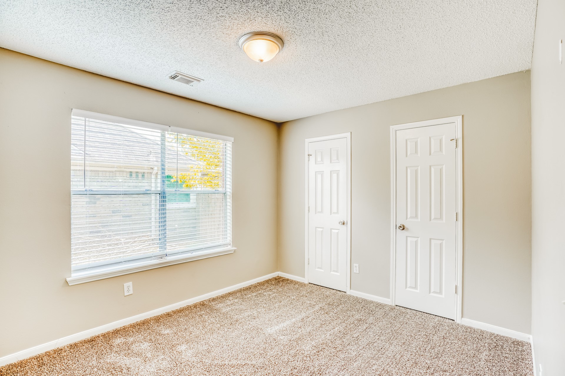 1635 Ridgebriar Drive Houston, TX 77014 - Photo 16 of 21 a view of an empty room with a window