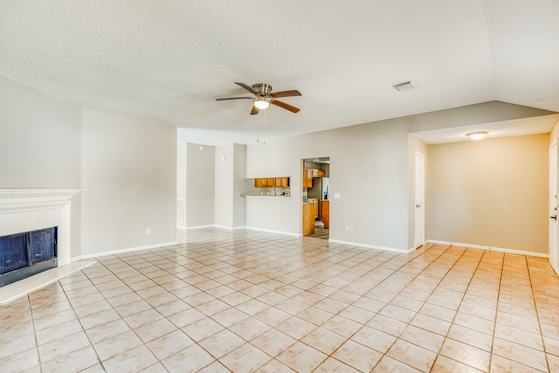 1635 Ridgebriar Drive Houston, TX 77014 - Photo 3 of 21 a view of an empty room with a fireplace