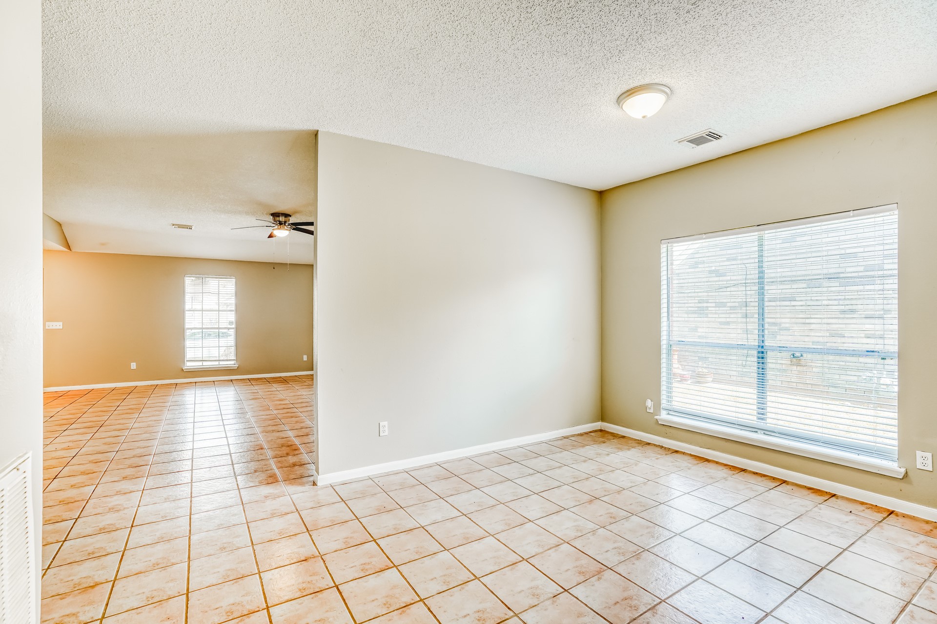 1635 Ridgebriar Drive Houston, TX 77014 - Photo 7 of 21 a view of an empty room and window
