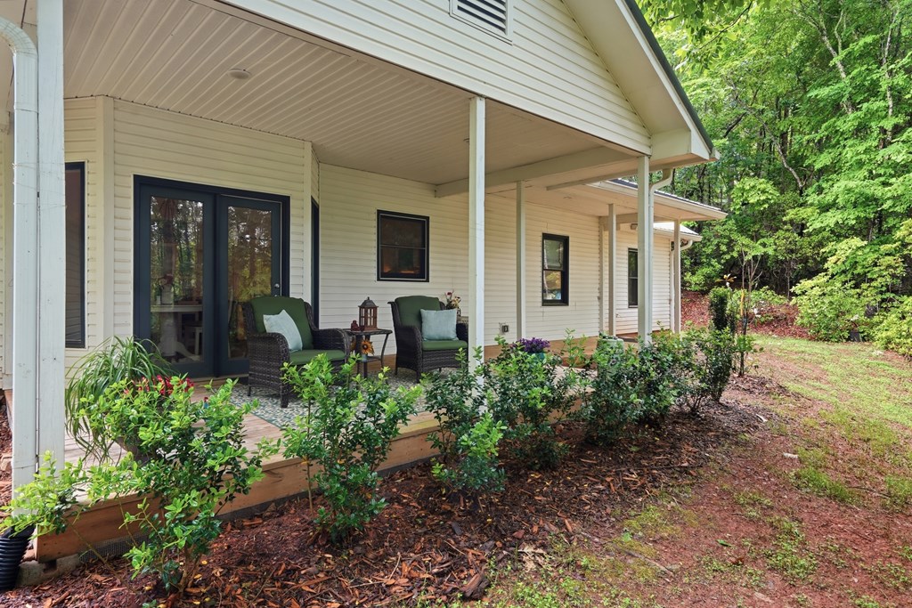 175 Crane Creek Road Young Harris, GA 30582 - Photo 33 of 40 a view of a house with patio
