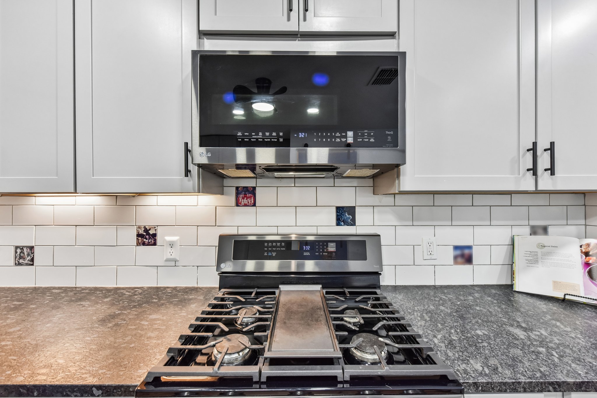 5405 Rusk Court Austin, TX 78723 - Photo 16 of 40 Culinary delights await in this modern kitchen with sleek appliances and ample counter space.