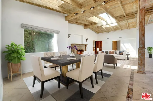 a view of a hall with wooden floor