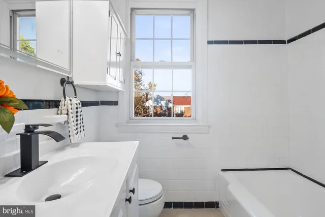 a view of empty room with windows