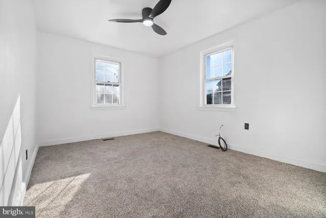 a view of a livingroom with wooden floor