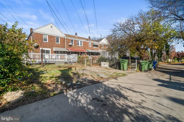 a balcony view with wooden fence