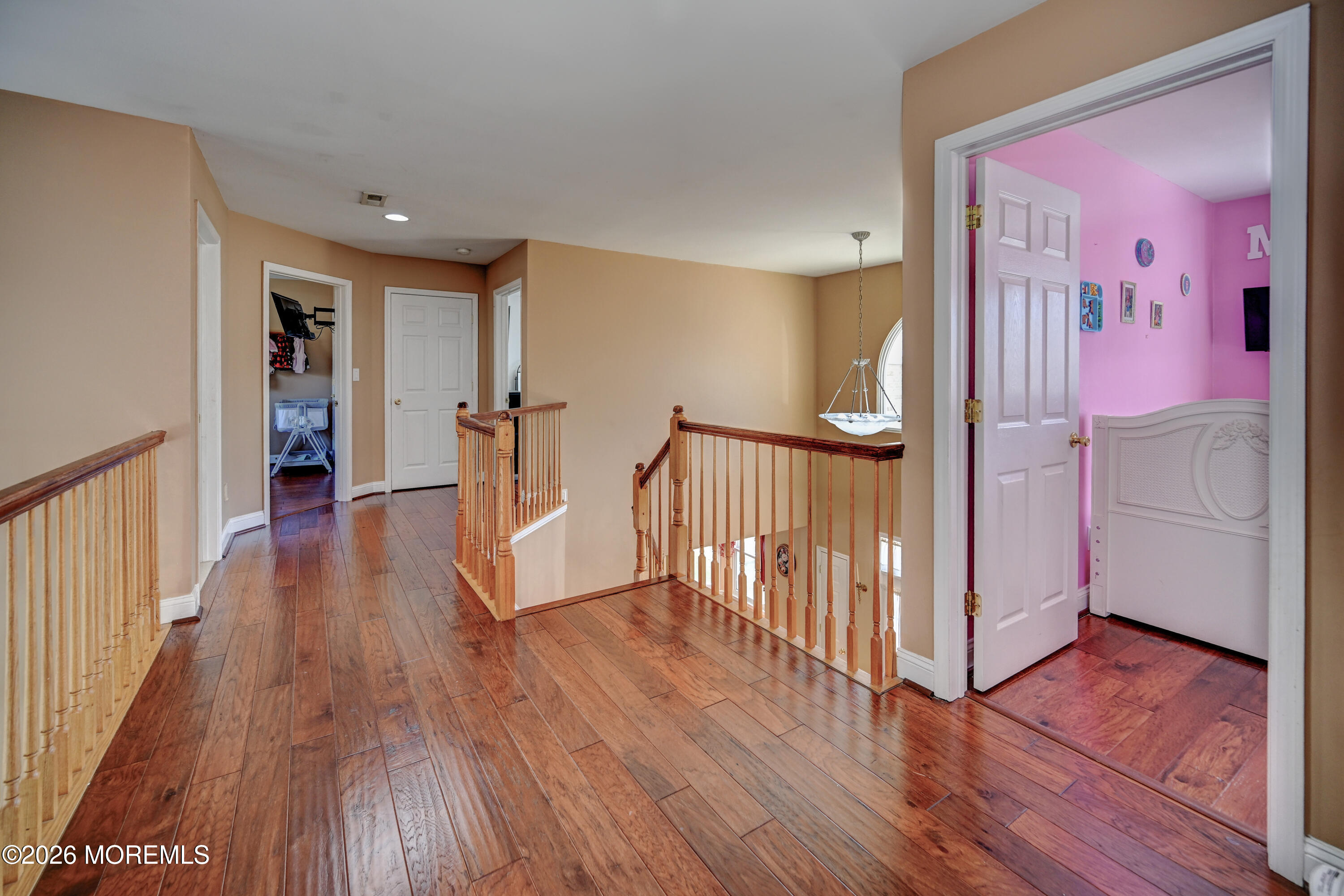 435 Vath Street Jackson, NJ 08527 - Photo 25 of 59 a view of a hallway with wooden floor and stairs