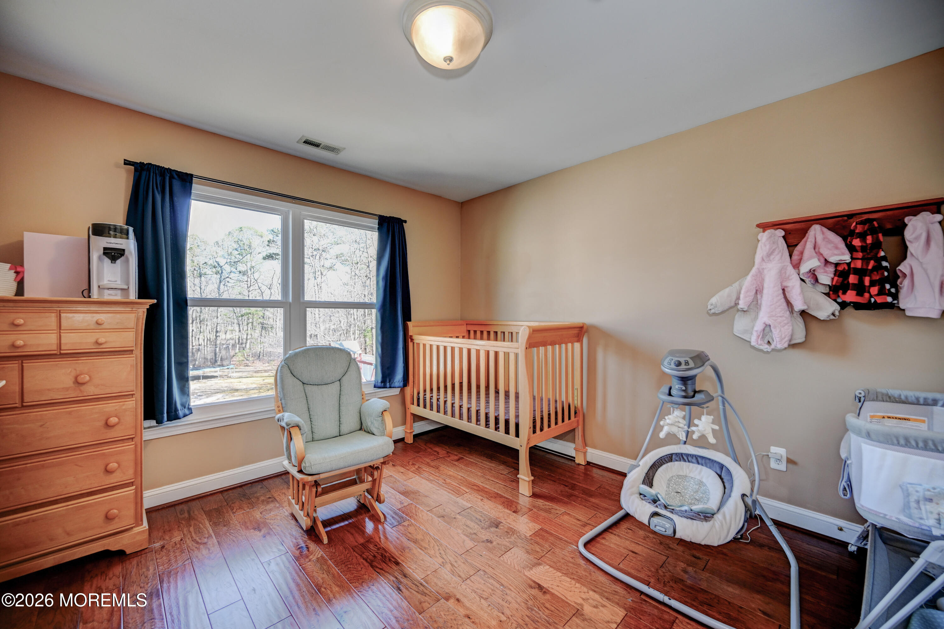 435 Vath Street Jackson, NJ 08527 - Photo 34 of 59 a living room with furniture and a window