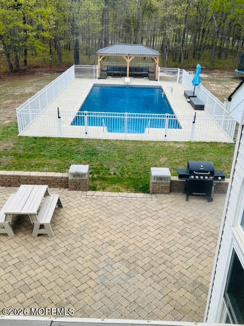 435 Vath Street Jackson, NJ 08527 - Photo 50 of 59 a view of a house with swimming pool and sitting area