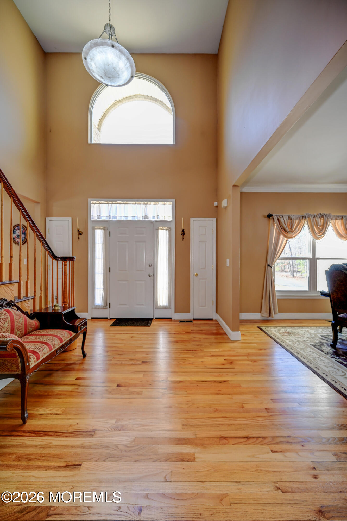 435 Vath Street Jackson, NJ 08527 - Photo 5 of 59 a view of an empty room with window and wooden floor