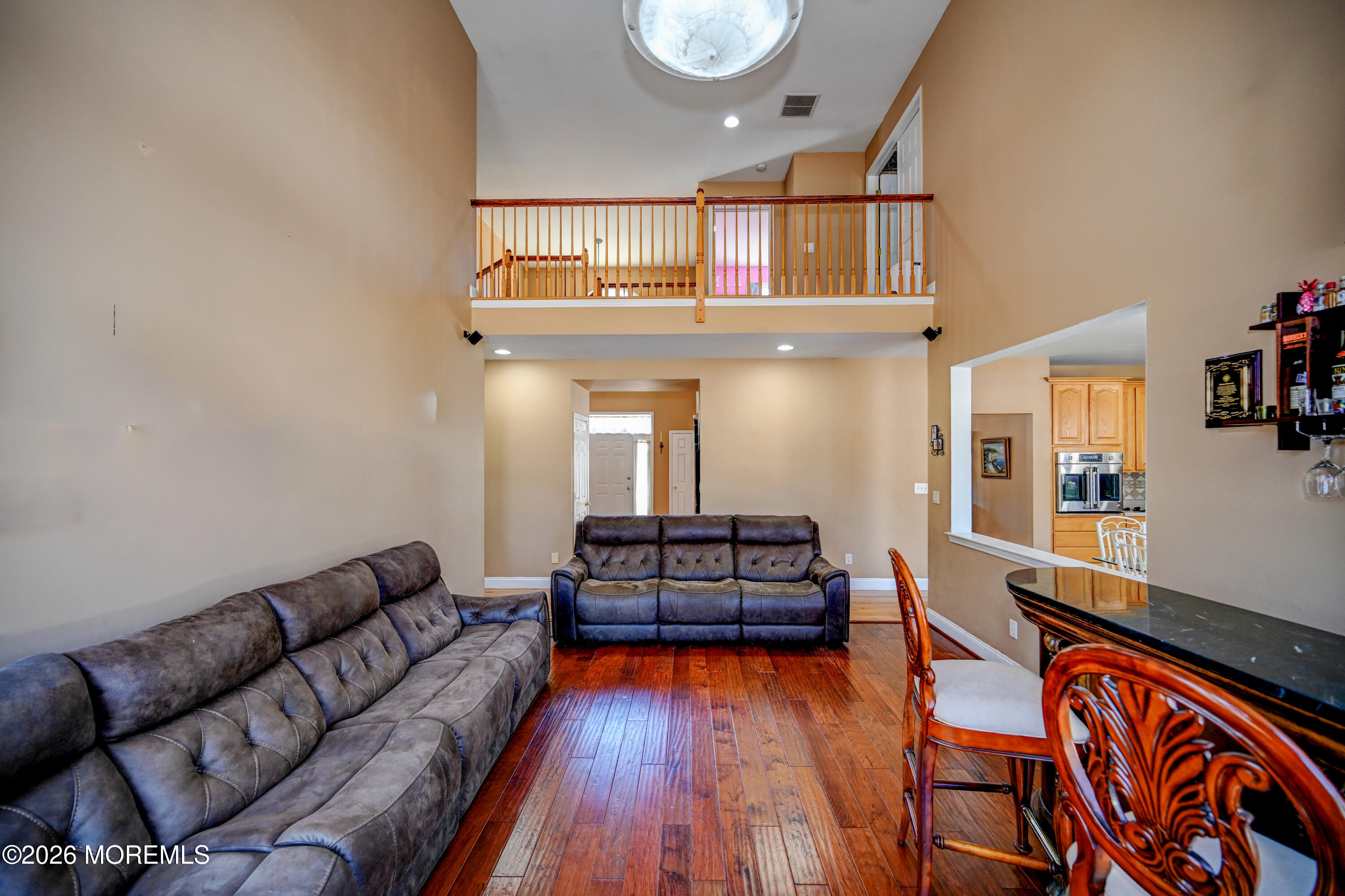 435 Vath Street Jackson, NJ 08527 - Photo 10 of 59 a living room with furniture and wooden floor