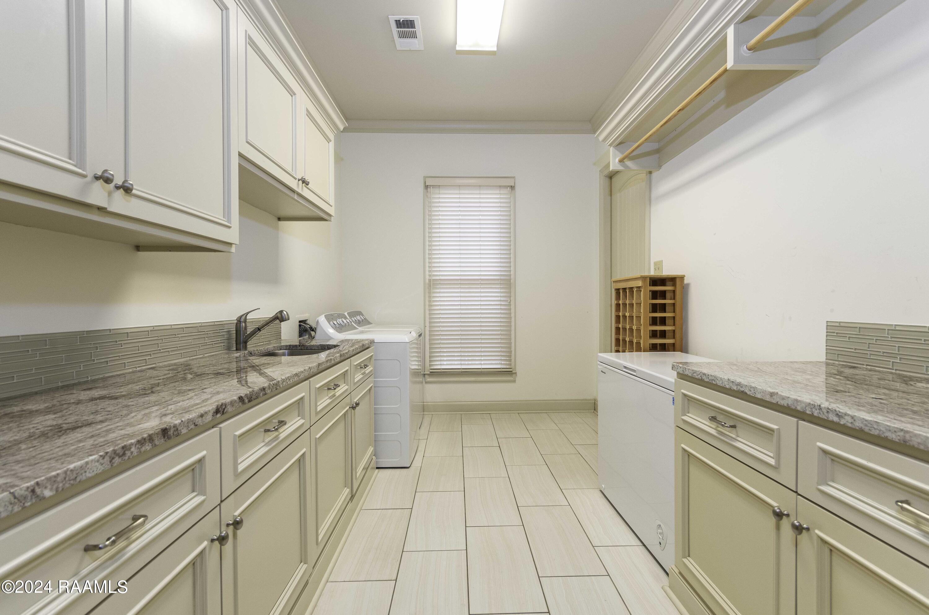 102 Brickell Way Lafayette, LA 70508 - Photo 27 of 30 Laundry 1