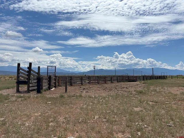 a view of a house with a big yard