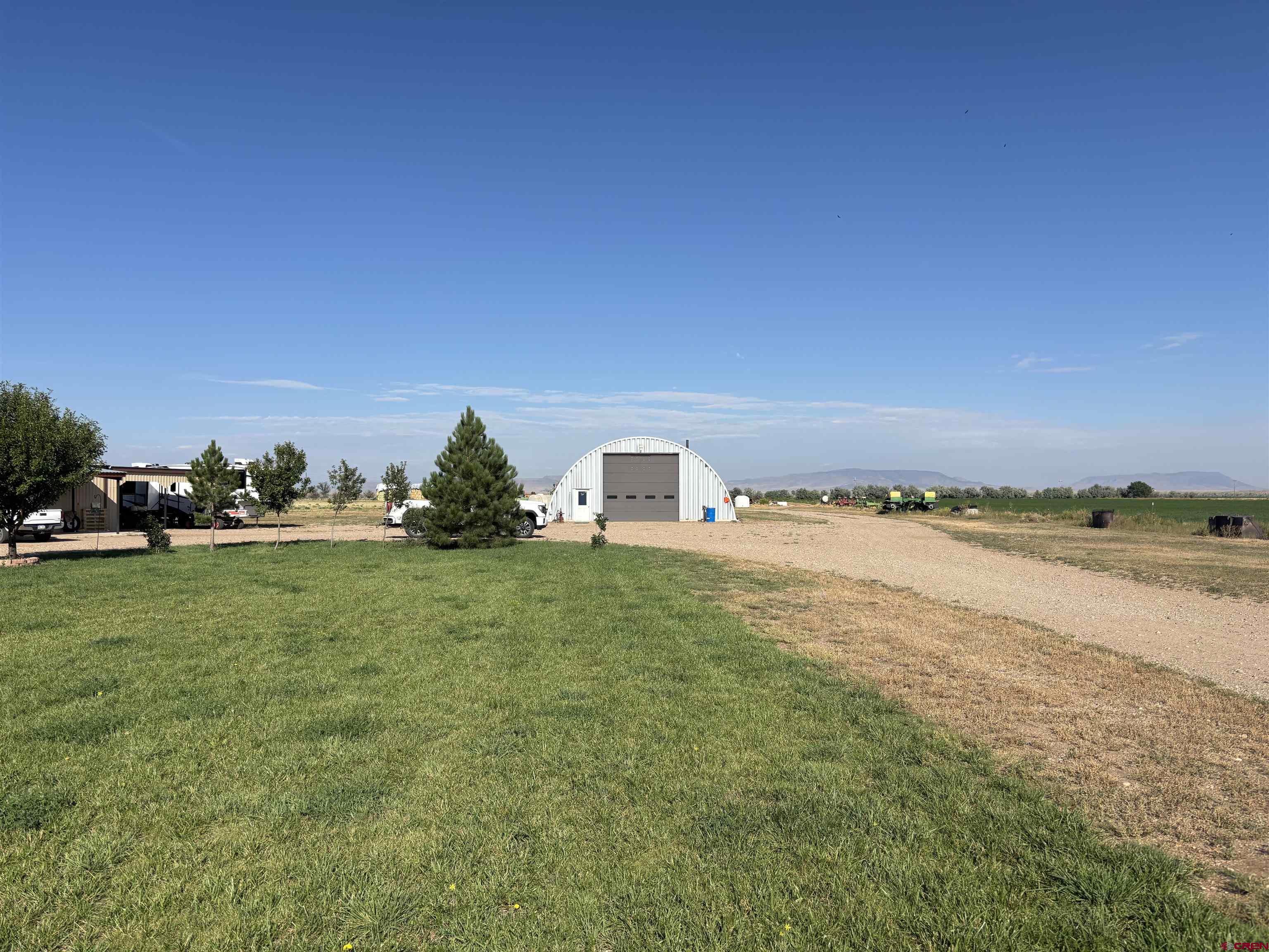 9227 County Rd C Jaroso, CO 81138 - Photo 24 of 28 a terrace with a garden