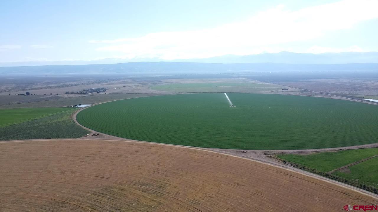 9227 County Rd C Jaroso, CO 81138 - Photo 3 of 28 a view of a field with an ocean view