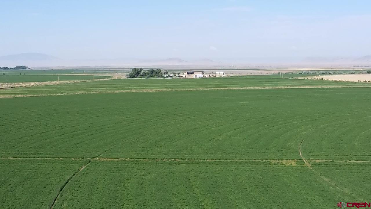9227 County Rd C Jaroso, CO 81138 - Photo 4 of 28 a view of a field with an ocean