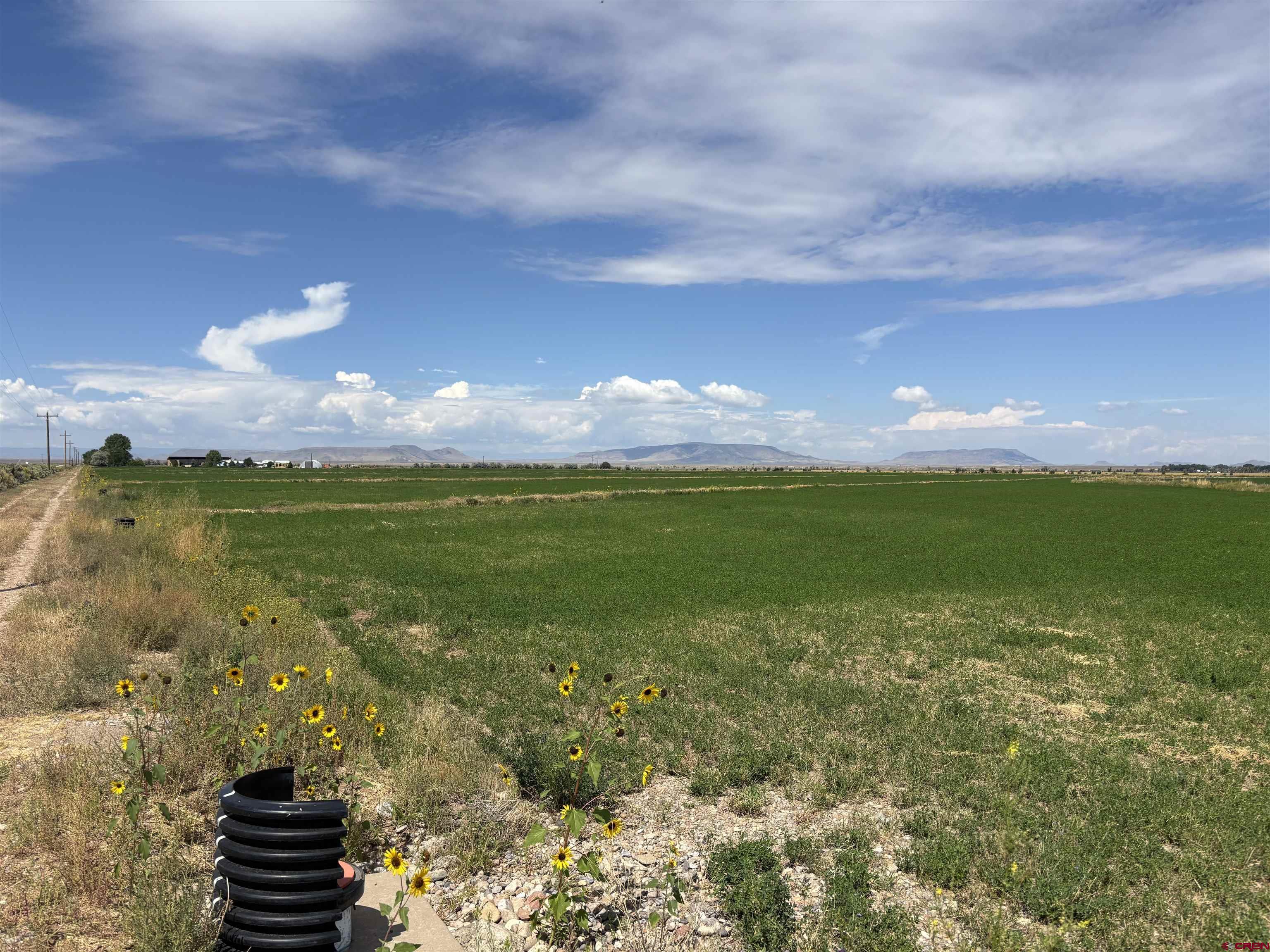 9227 County Rd C Jaroso, CO 81138 - Photo 10 of 28 a view of a lake from a yard