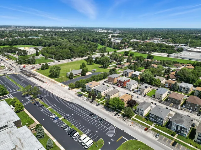 an aerial view of a city with lots of residential buildings