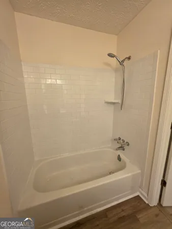 a bathroom with a bathtub