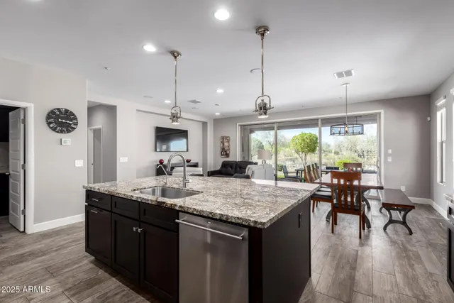 a living room with furniture and a table