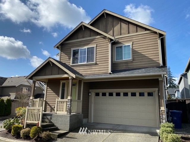 419 203rd Place Southeast Bothell, WA 98012 - Photo 1 of 30 a front view of a house with a yard
