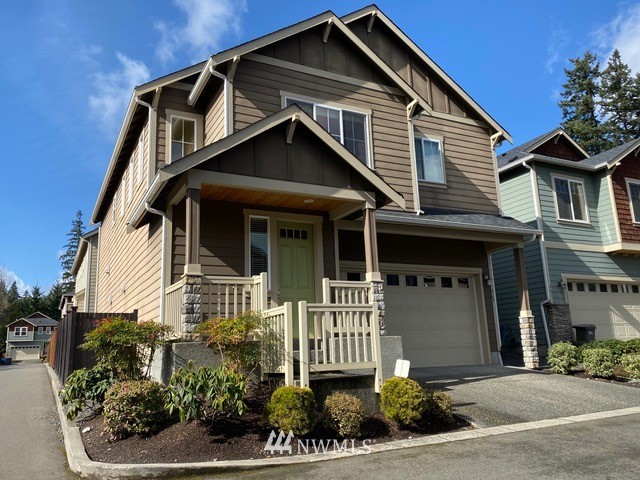 419 203rd Place Southeast Bothell, WA 98012 - Photo 2 of 30 a front view of a house with a yard