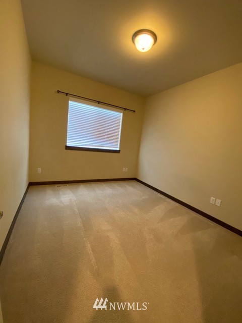 419 203rd Place Southeast Bothell, WA 98012 - Photo 12 of 30 a view of an empty room with a window