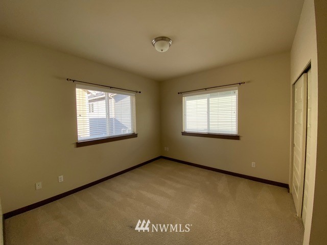 419 203rd Place Southeast Bothell, WA 98012 - Photo 13 of 30 a view of an empty room with a window