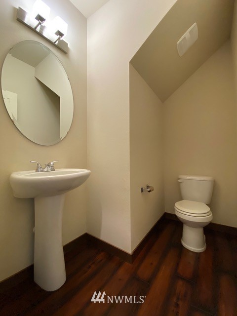 419 203rd Place Southeast Bothell, WA 98012 - Photo 16 of 30 a bathroom with a sink toilet and mirror