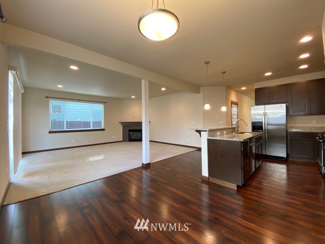 419 203rd Place Southeast Bothell, WA 98012 - Photo 17 of 30 a view of kitchen with cabinets and wooden floor