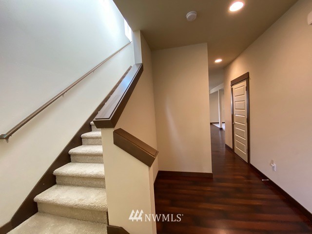419 203rd Place Southeast Bothell, WA 98012 - Photo 4 of 30 a view of entryway with wooden floor