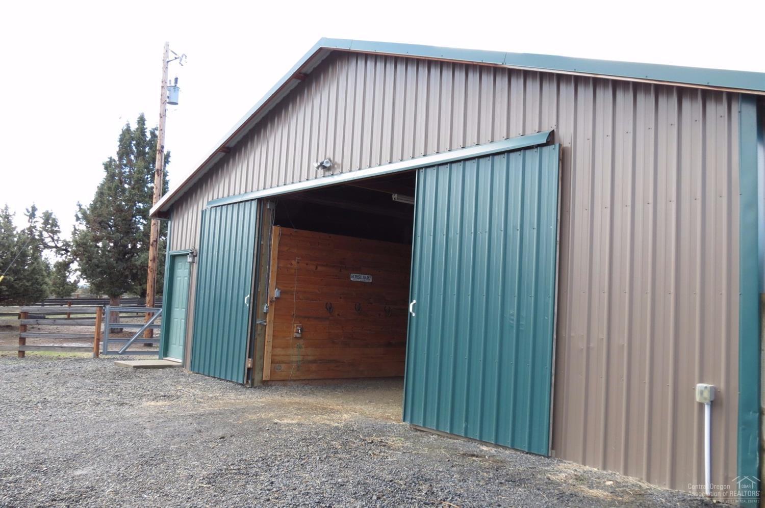 10486 Ridgeview Road Prineville, OR 97754 - Photo 24 of 25 Barn with 2 stables and insulated tack r