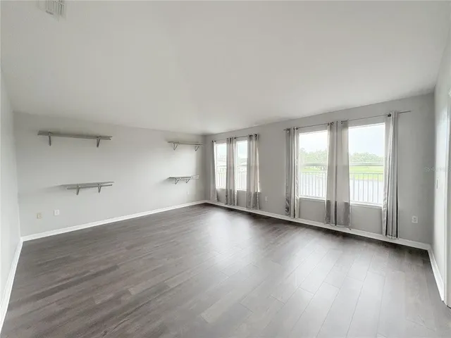 a view of small space with wooden floor