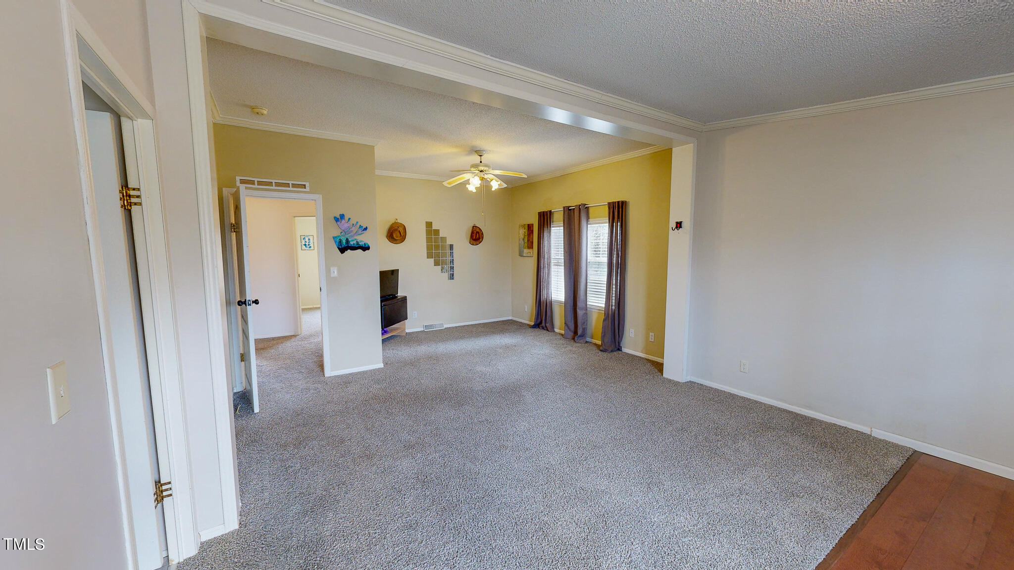 733 Oliver Loop Road Roxboro, NC 27574 - Photo 15 of 28 a view of a hallway with wooden shelves