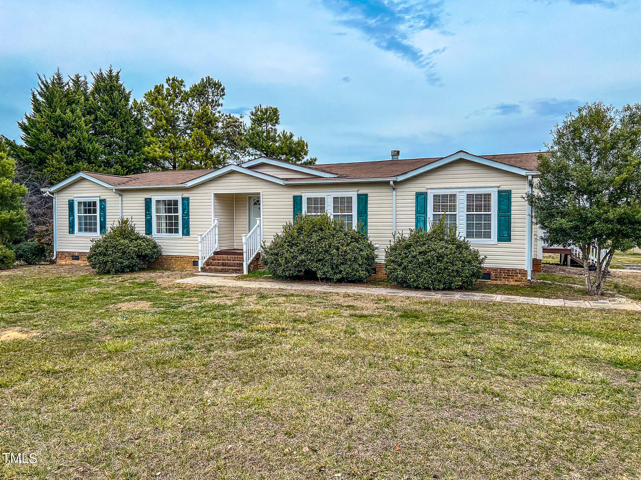 733 Oliver Loop Road Roxboro, NC 27574 - Photo 16 of 28 a house with a outdoor space