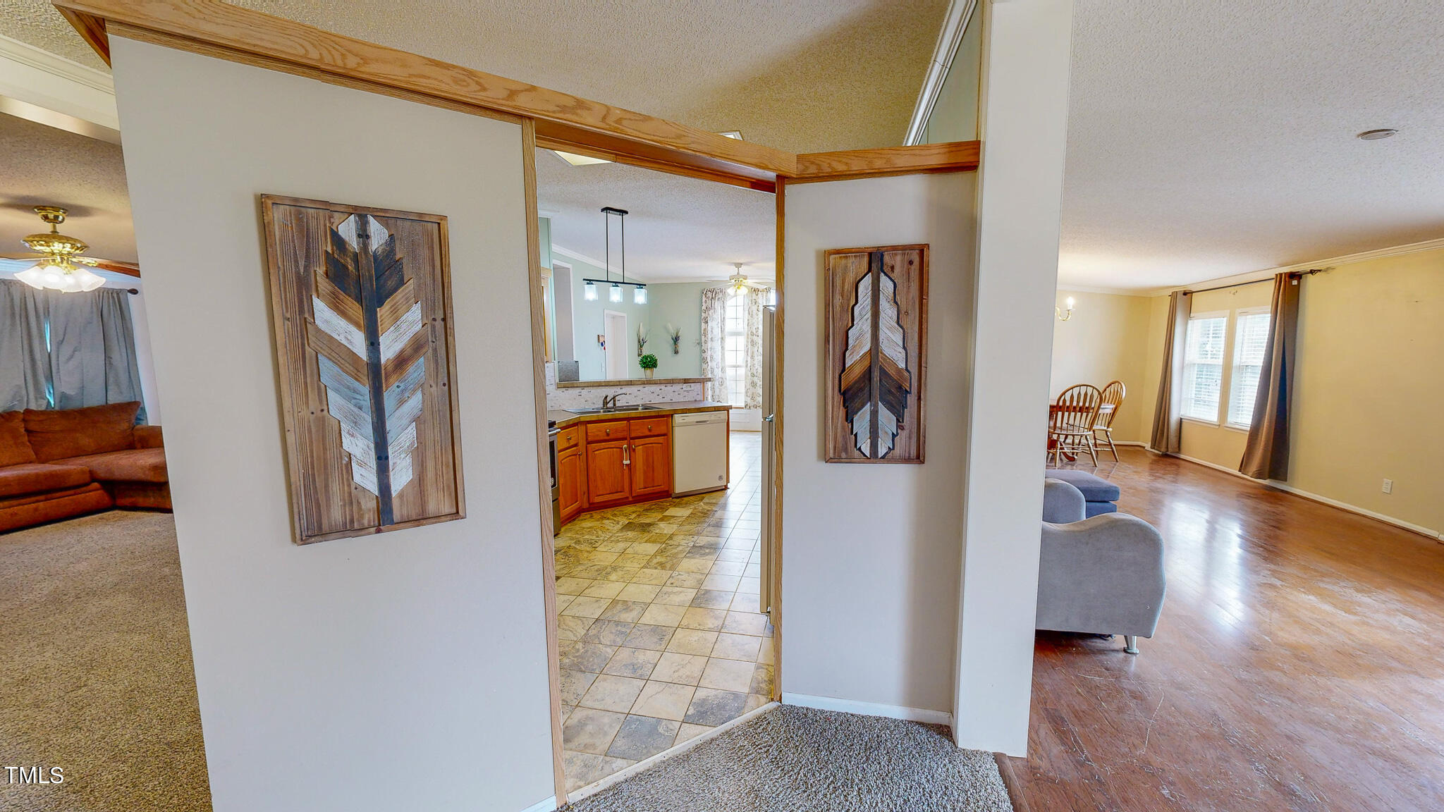 733 Oliver Loop Road Roxboro, NC 27574 - Photo 24 of 28 a hallway with wooden floor and windows