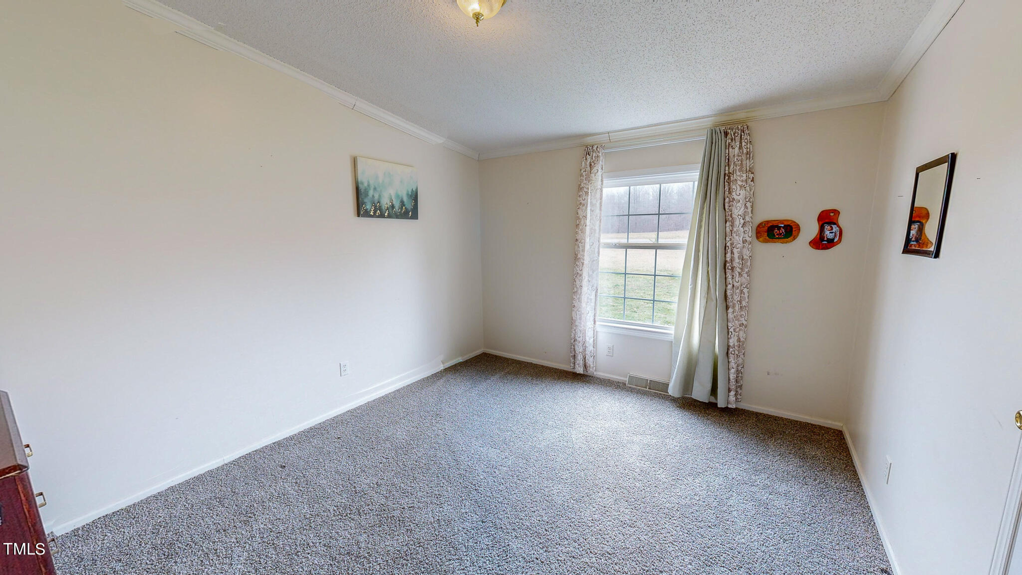 733 Oliver Loop Road Roxboro, NC 27574 - Photo 27 of 28 an empty room with shelves