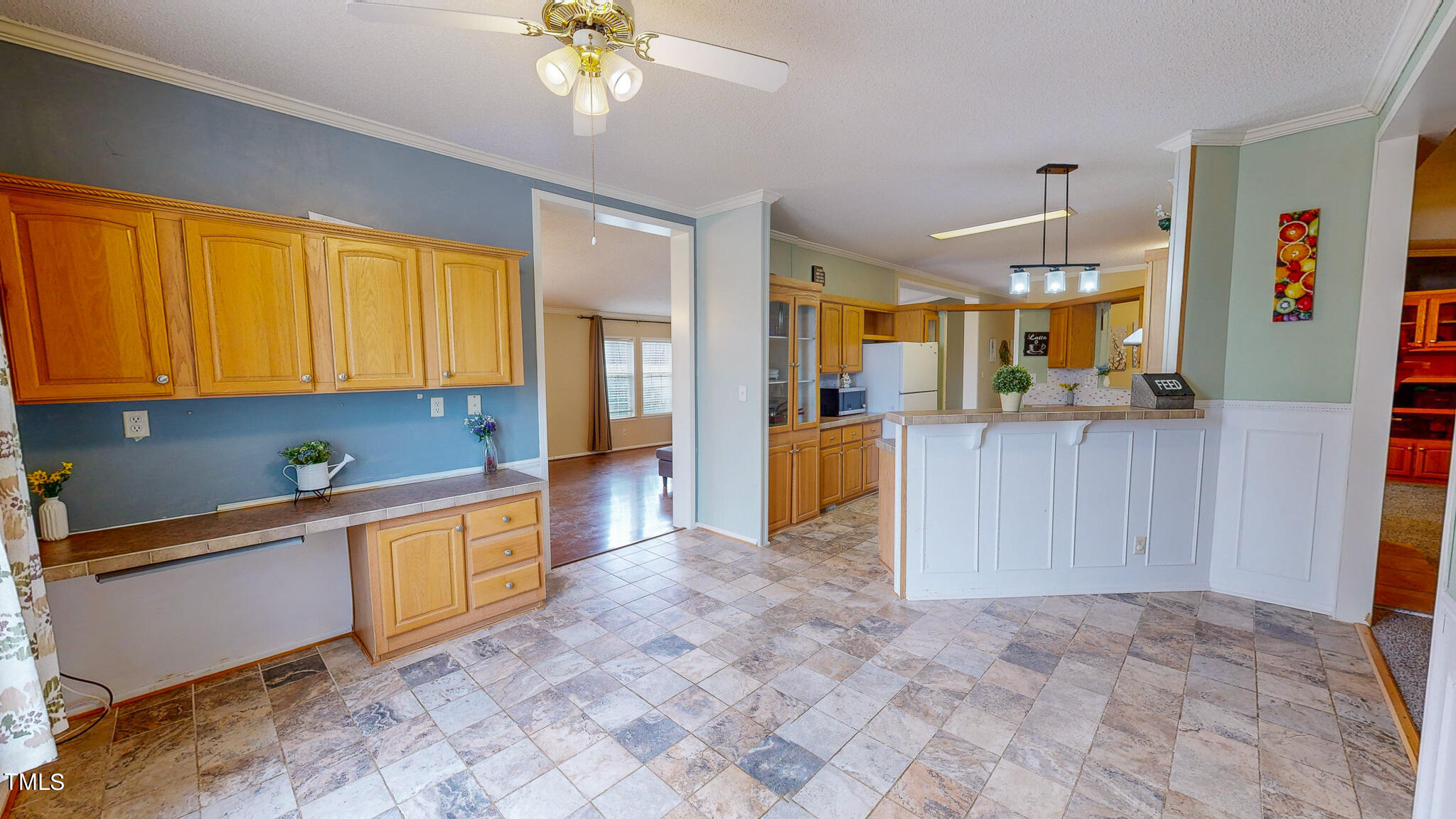 733 Oliver Loop Road Roxboro, NC 27574 - Photo 6 of 28 a large kitchen with stainless steel appliances granite countertop a refrigerator and a sink