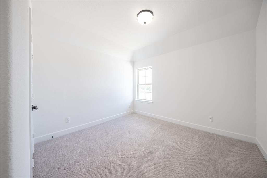 2719 Triumph Court Heath, TX 75126 - Photo 12 of 39 a view of room and window