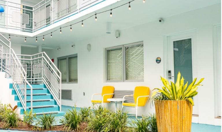 7710 Harding Avenue, Unit 2 Miami Beach, FL 33141 - Photo 3 of 3 a view of swimming pool with seating area