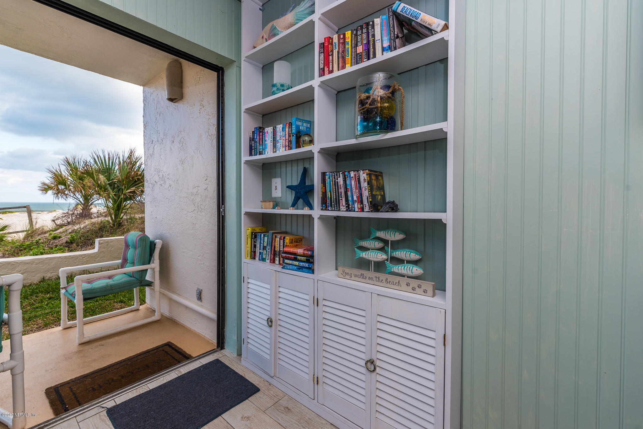 6970 A1A South, Unit 133 St. Augustine, FL 32080 - Photo 5 of 26 a room with book shelf and a window