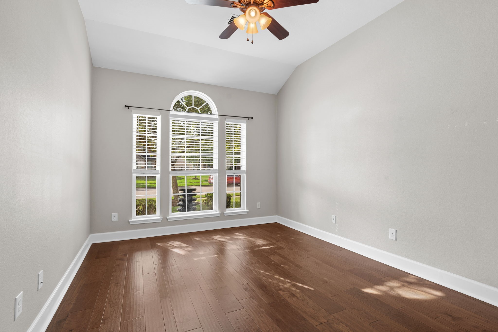 3426 Summer Ranch Drive Katy, TX 77494 - Photo 27 of 48 Bedroom 2 features beautiful flooring, soft natural light, and ample space for personalization, making it ideal for family or guests.