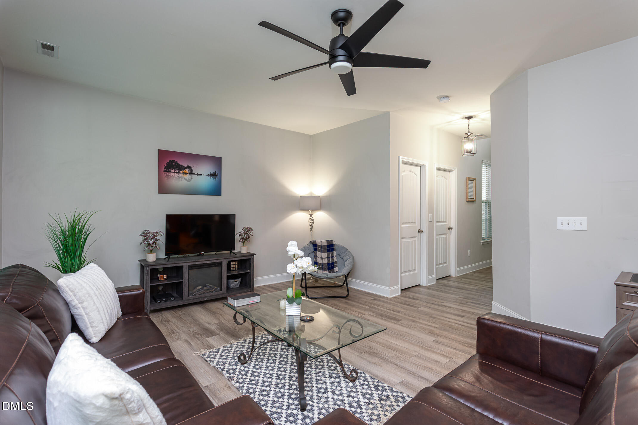 4307 Lord Mario Court Raleigh, NC 27610 - Photo 7 of 29 LR & front entrance-4