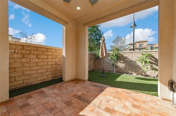 a bedroom with a workspace
